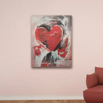 «Cuore astratto rosso» di Daniela Marangone, stampa su tela in un angolo lettura