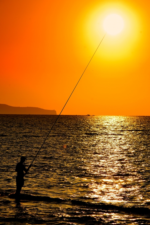 tramonto con pescatore