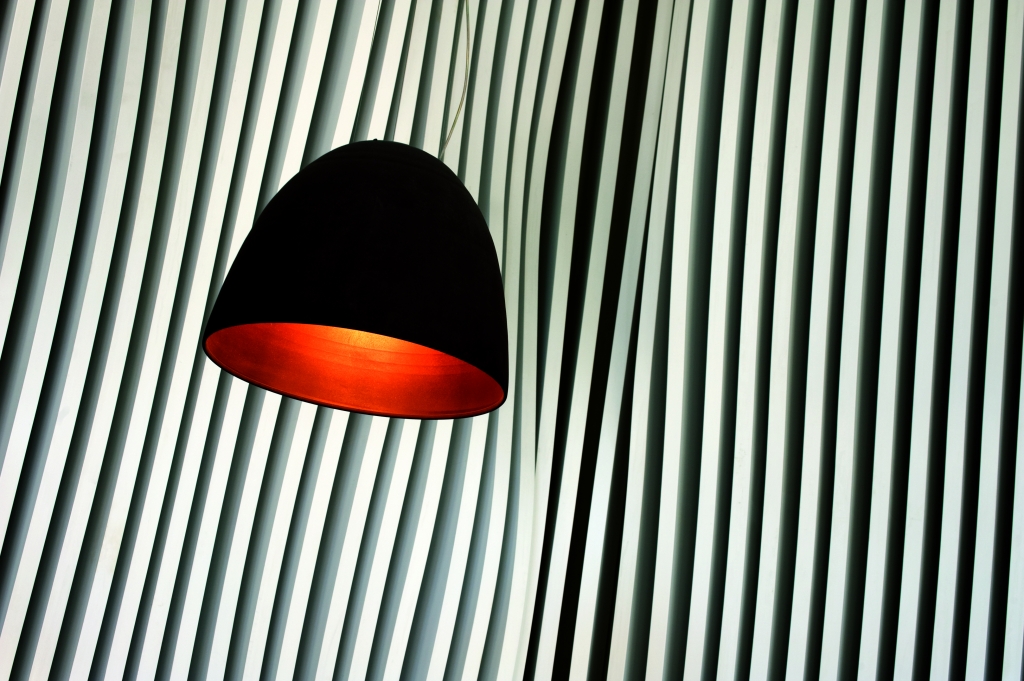 Suspended Lamp on a Curvy Wall