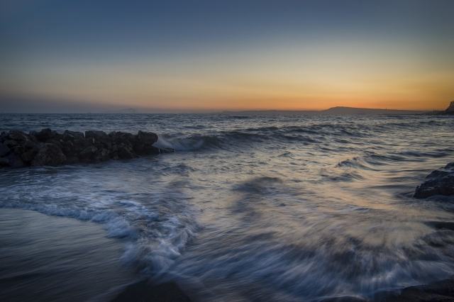 Tramonto onda su onda