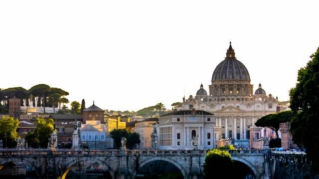 Walls of the Tiber river and the Basilica of San Pietro. Rome