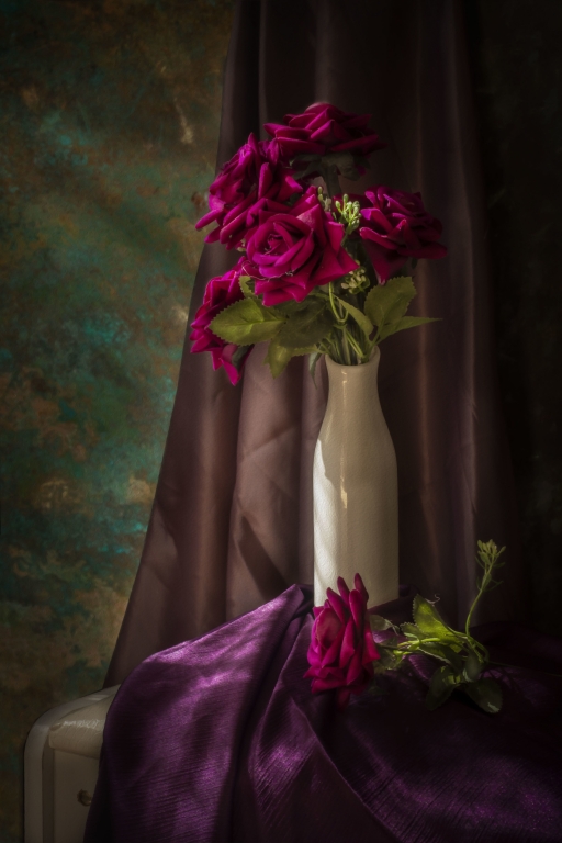 Flowers still life , photo for red flowers and pomegranates