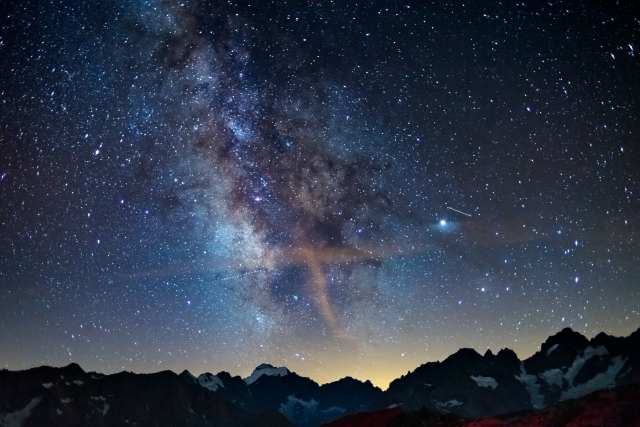 The Milky Way and starry sky on the Alps