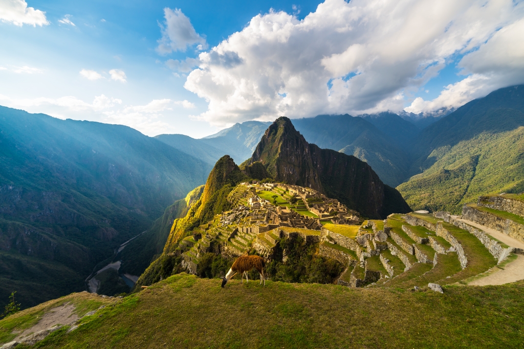 sunlight and sun rays over Machu Picchu, Peru