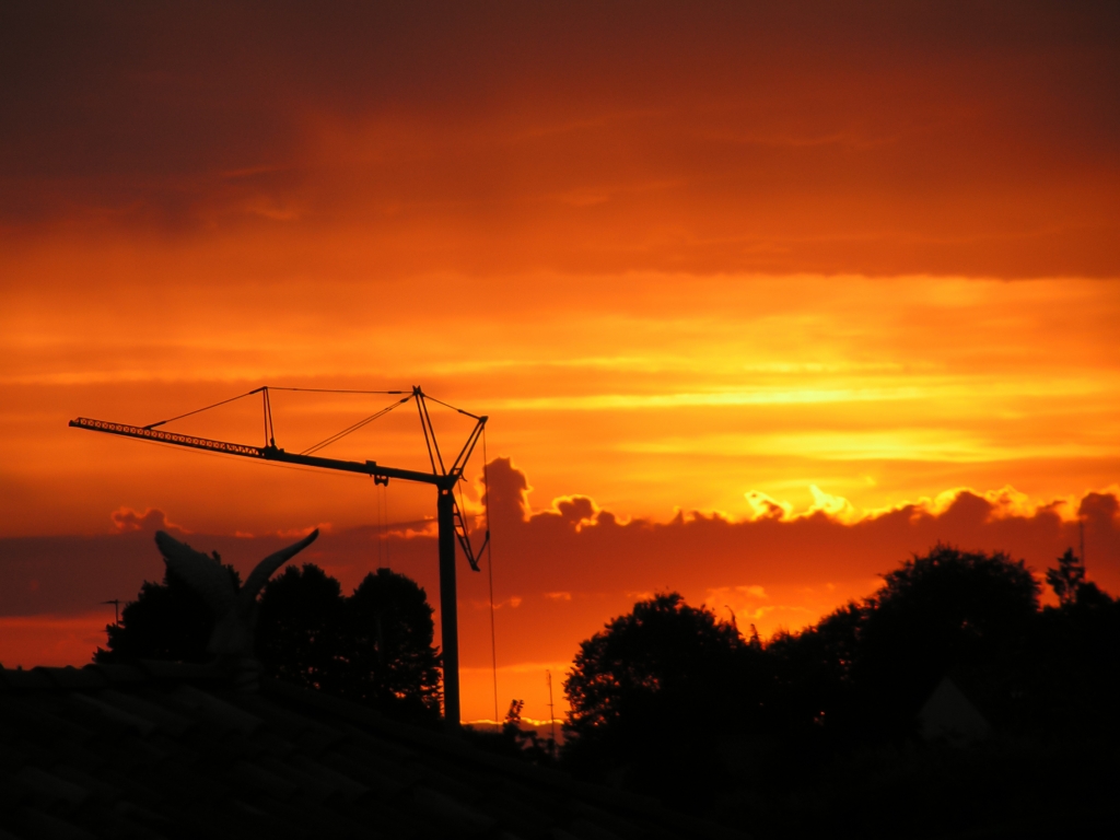 Alba tra i tetti