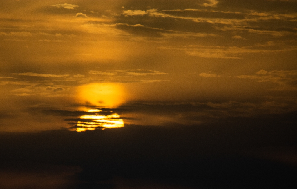 il sole tra le nubi