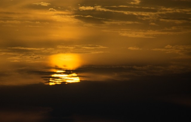 il sole tra le nubi