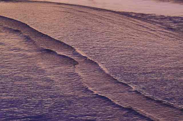 tramonto sulle onde