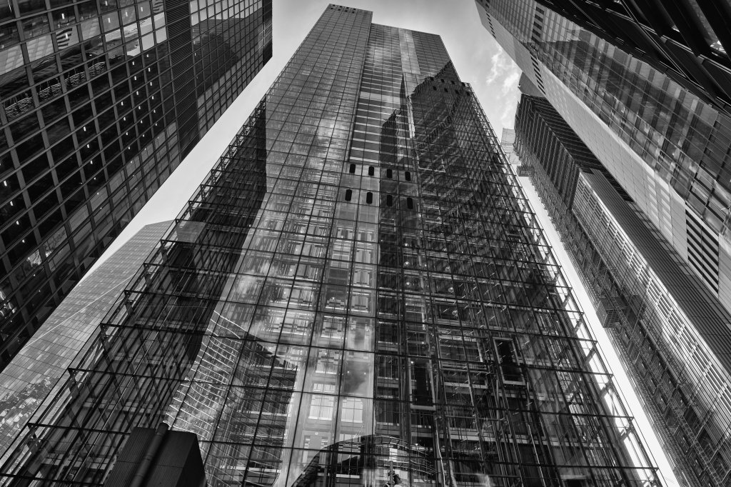 Panoramic abstract photograph of modern glass architecture in cit